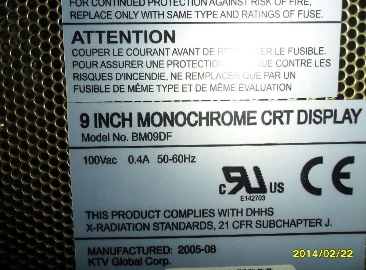 Mitsubishi MELDAS System Original CRT Monitor BM09DF — Photograph of aging 9-inch amber CRT with severe brightness degradation